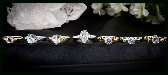 A collection of several engagement rings representing current design trends