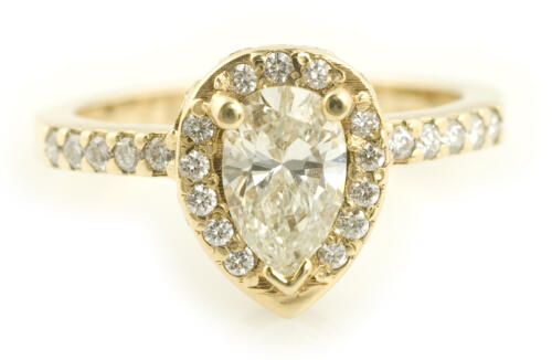 Pear Cut Diamond Halo Engagement Ring in Yellow Gold