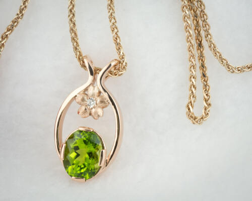 Oval peridot mothers pendant