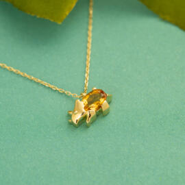 Citrine Oval Dinosaur Necklace in 14k Yellow Gold side view