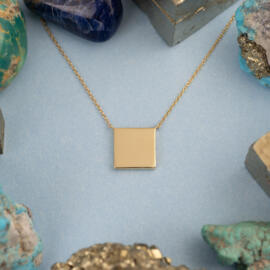 Blue Checkered Enamel Necklace in 14 karat Yellow Gold with cable chain posed back.