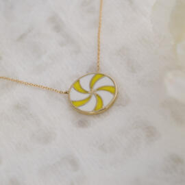 Lemon Drop Swirl Necklace with Enamel in 14 karat Yellow Gold and cable chain posed side view