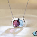 Union articulating pendant with rhodolite garnet and blue topaz